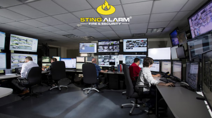 Sting Alarm monitoring center with security professionals reviewing multiple camera feeds.
